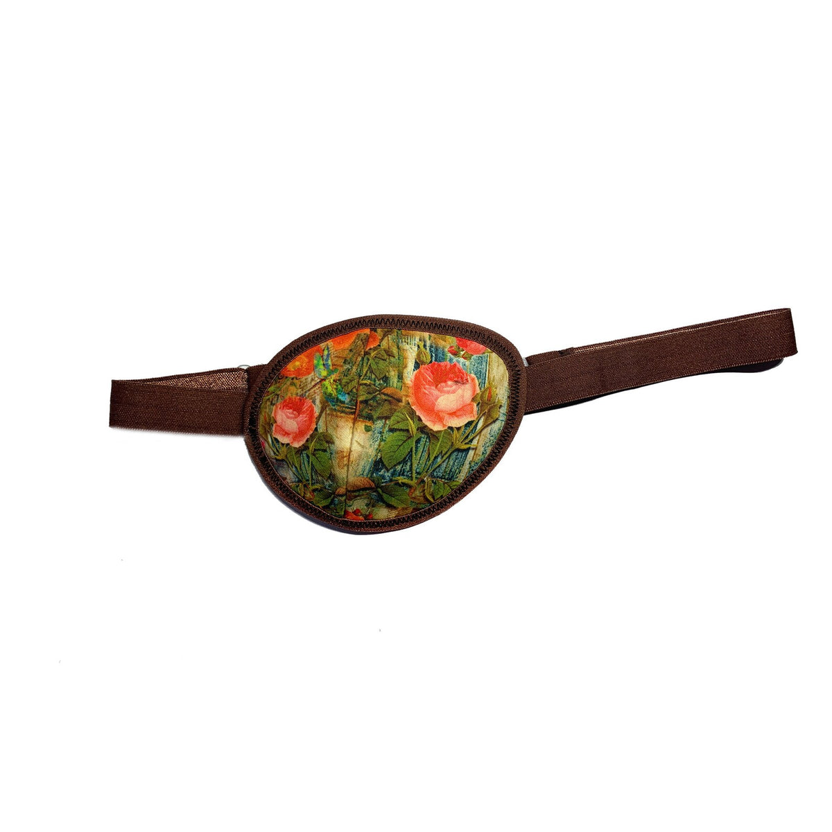 Rose Garden Pirate Eye Patch with pink roses and green leaves on cream background, brown fabric border and elastic strap