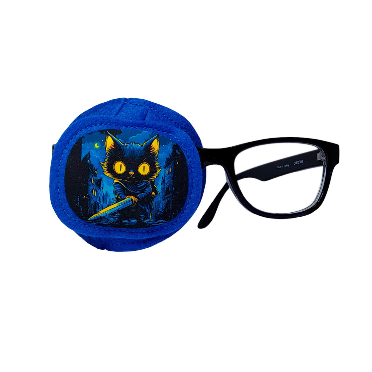 Blue wool felt eye patch with black warrior cat holding a sword under a moonlit city sky, shown on glasses